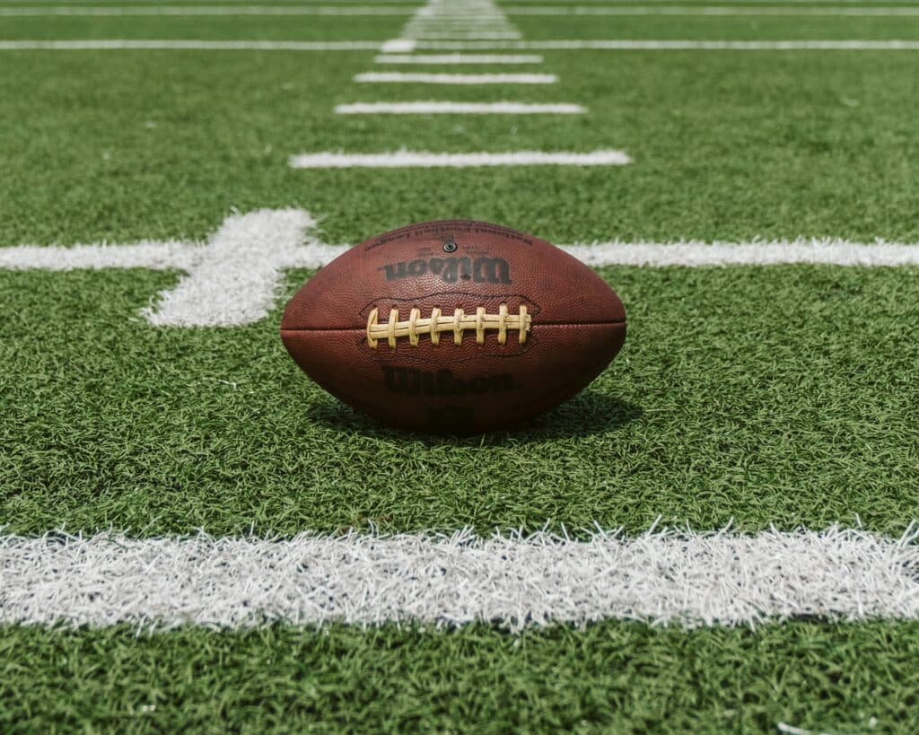 Closeup of football on football field
